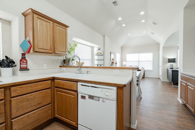 1415 Clubhill Dr, Rockwall, TX 75087 - kitchen with white dishwasher, a sink, a peninsula, recessed lighting, and vaulted ceiling