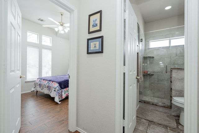 1415 Clubhill Dr, Rockwall, TX 75087 - ensuite bathroom featuring healthy amount of natural light, a ceiling fan, and a stall shower