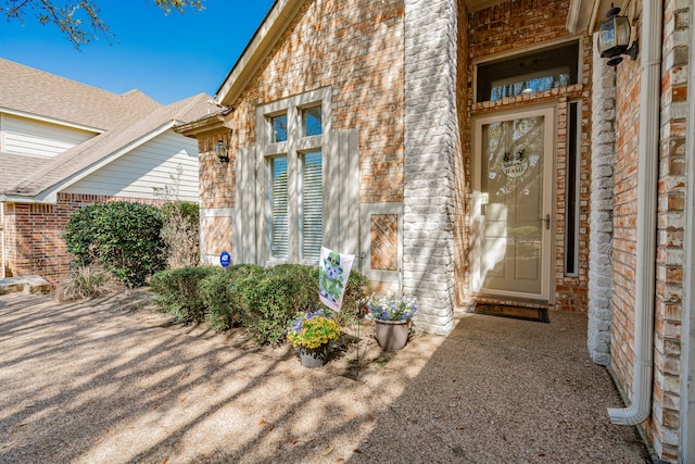 1415 Clubhill Dr, Rockwall, TX 75087 - property entrance with brick siding and stone siding