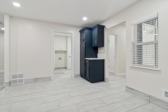 1006 Tower Dr, Cedar Hill, TX 75104 - kitchen featuring light countertops, recessed lighting, and baseboards