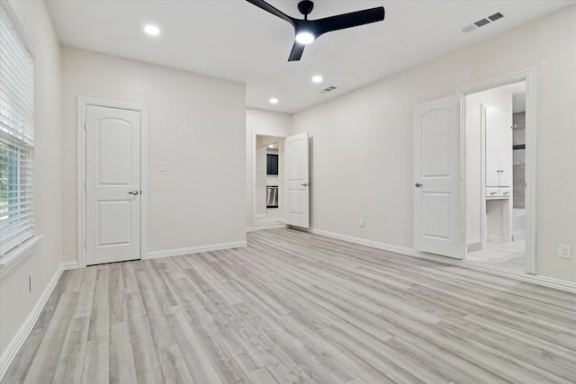 1006 Tower Dr, Cedar Hill, TX 75104 - unfurnished bedroom with light wood-style flooring, connected bathroom, recessed lighting, baseboards, and a ceiling fan