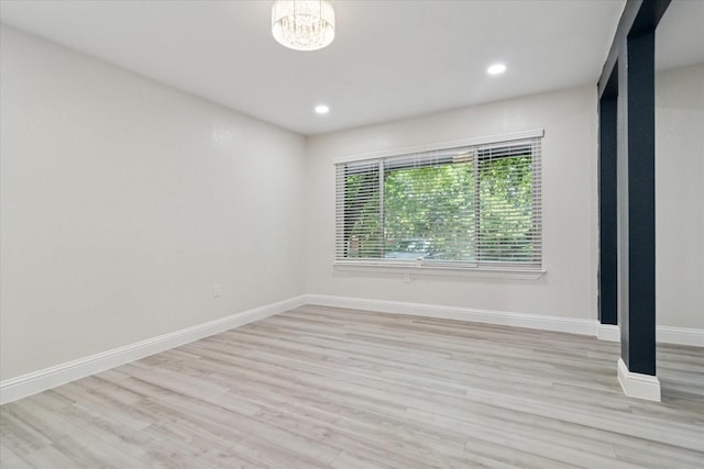 1006 Tower Dr, Cedar Hill, TX 75104 - spare room with light wood finished floors, baseboards, recessed lighting, and a chandelier