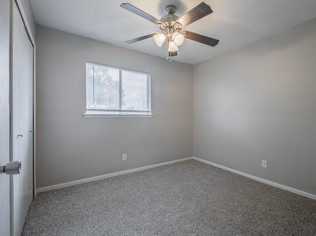 1901 Castille Dr, Carrollton, TX 75007 - carpeted spare room with ceiling fan and baseboards