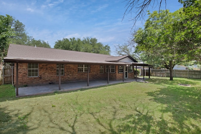 214 Bluebonnet Trl, Keene, TX 76059 - back of property featuring brick siding and a patio area