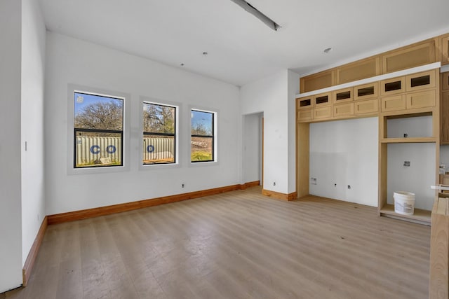 1010 W Mcdonwell School Rd, Colleyville, TX 76034 - unfurnished bedroom featuring light wood finished floors and baseboards