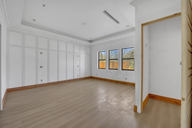 1010 W Mcdonwell School Rd, Colleyville, TX 76034 - unfurnished bedroom with wood finished floors, baseboards, and a raised ceiling