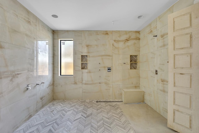 1010 W Mcdonwell School Rd, Colleyville, TX 76034 - bathroom featuring tile walls and tiled shower