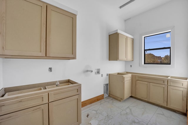 1010 W Mcdonwell School Rd, Colleyville, TX 76034 - washroom featuring light marble finish flooring, cabinet space, baseboards, electric dryer hookup, and washer hookup