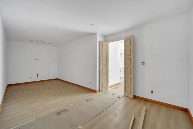 1010 W Mcdonwell School Rd, Colleyville, TX 76034 - empty room featuring light wood finished floors and baseboards