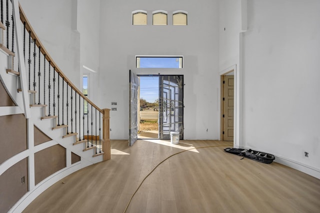 1010 W Mcdonwell School Rd, Colleyville, TX 76034 - entrance foyer featuring a towering ceiling, wood finished floors, and stairway