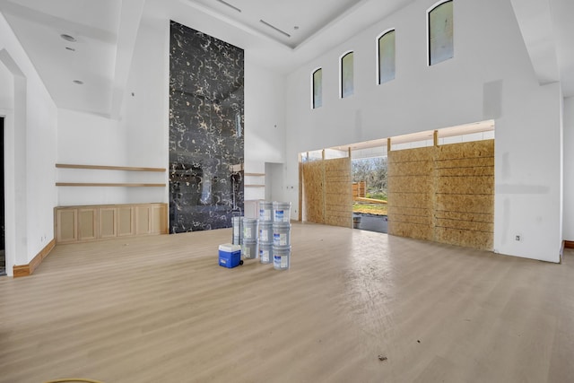 1010 W Mcdonwell School Rd, Colleyville, TX 76034 - unfurnished living room featuring a towering ceiling and wood finished floors