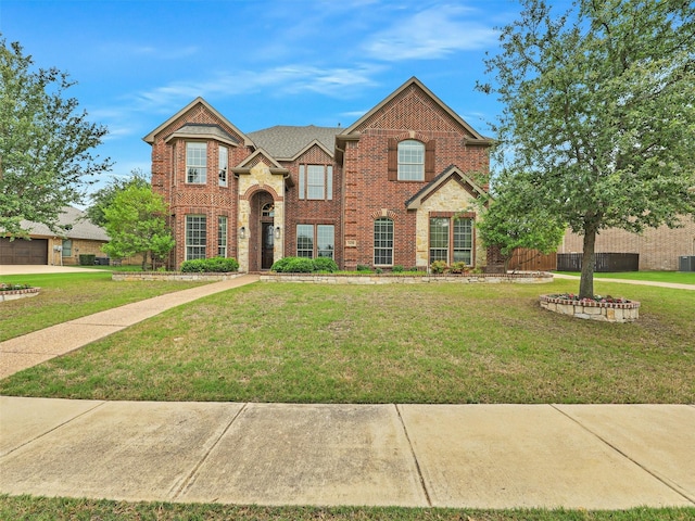 2420 Lilyfield Dr, Trophy Club, TX 76262 - traditional-style home featuring driveway, a garage, and brick siding