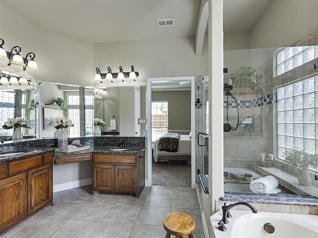 2420 Lilyfield Dr, Trophy Club, TX 76262 - ensuite bathroom featuring a tile shower, vanity, a bath, and tile patterned flooring