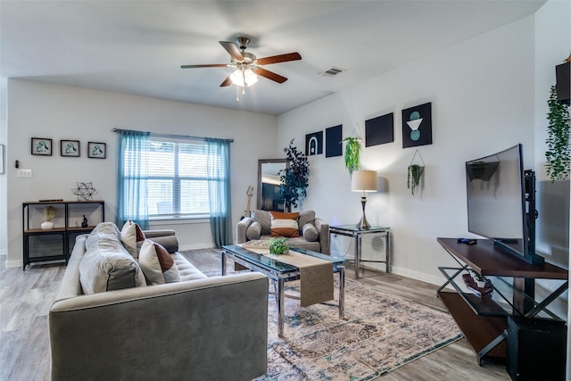 8325 High Garden St, Fort Worth, TX 76123 - living room with ceiling fan, wood finished floors, and baseboards