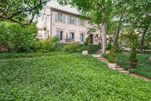 4107 Turtle Creek Blvd, Dallas, TX 75219 - rear view of property featuring stucco siding and stairway