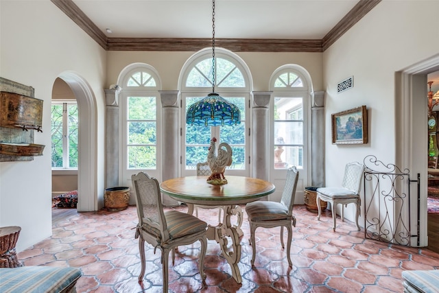 4107 Turtle Creek Blvd, Dallas, TX 75219 - dining area featuring healthy amount of natural light and ornamental molding
