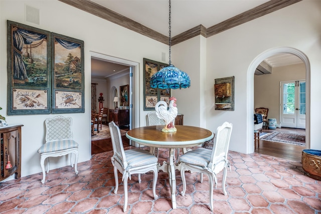 4107 Turtle Creek Blvd, Dallas, TX 75219 - dining room featuring arched walkways and crown molding
