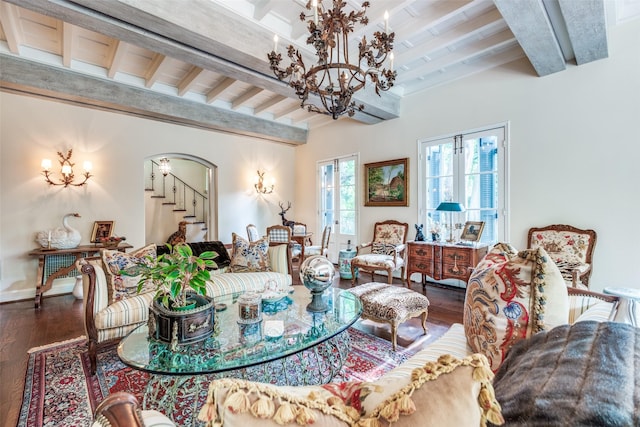 4107 Turtle Creek Blvd, Dallas, TX 75219 - living room with a chandelier, beam ceiling, wood finished floors, and stairway