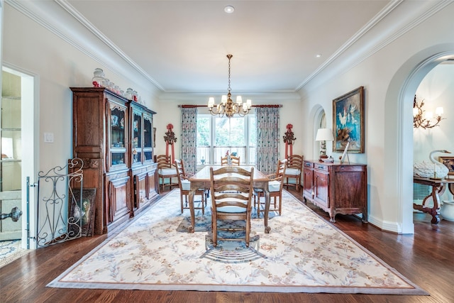 4107 Turtle Creek Blvd, Dallas, TX 75219 - dining area with a chandelier, dark wood-style flooring, arched walkways, ornamental molding, and baseboards