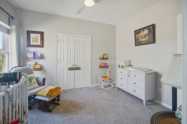 10014 Fairway Vista Dr, Rowlett, TX 75089 - carpeted bedroom with a closet, ceiling fan, and baseboards