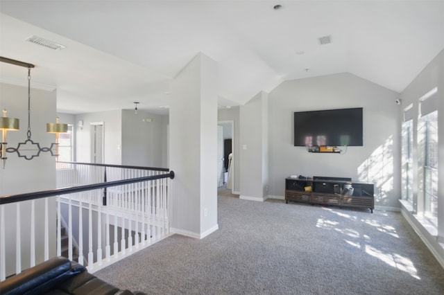 10014 Fairway Vista Dr, Rowlett, TX 75089 - living room with healthy amount of natural light, carpet flooring, vaulted ceiling, and baseboards