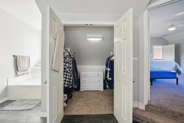 10014 Fairway Vista Dr, Rowlett, TX 75089 - walk in closet with dark colored carpet and a wall unit AC