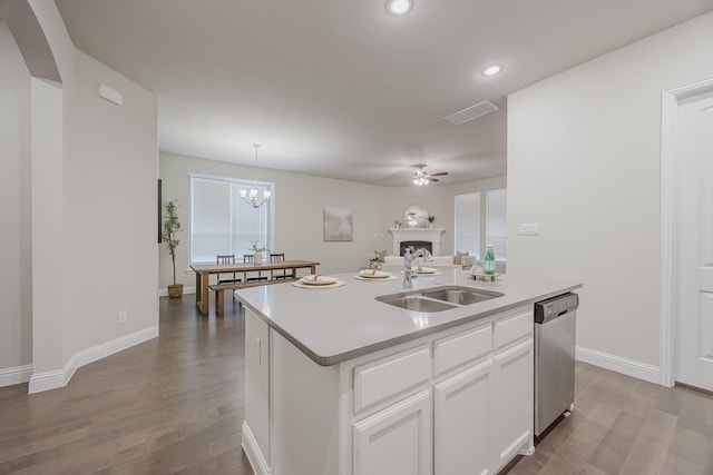 14844 Gentry Dr, Aledo, TX 76008 - kitchen featuring a sink, stainless steel dishwasher, a ceiling fan, wood finished floors, and a kitchen island with sink