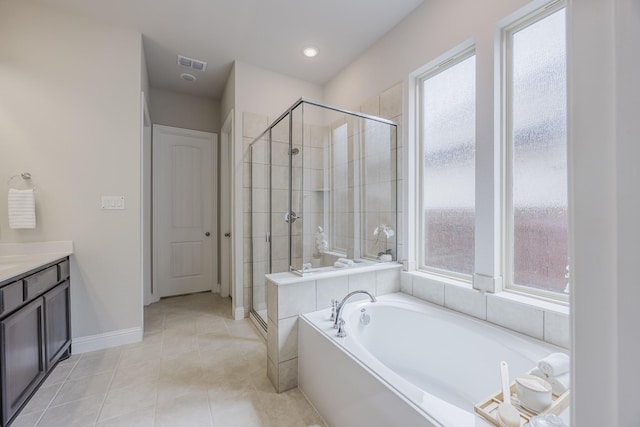 14844 Gentry Dr, Aledo, TX 76008 - bathroom featuring a bath, a stall shower, healthy amount of natural light, and vanity