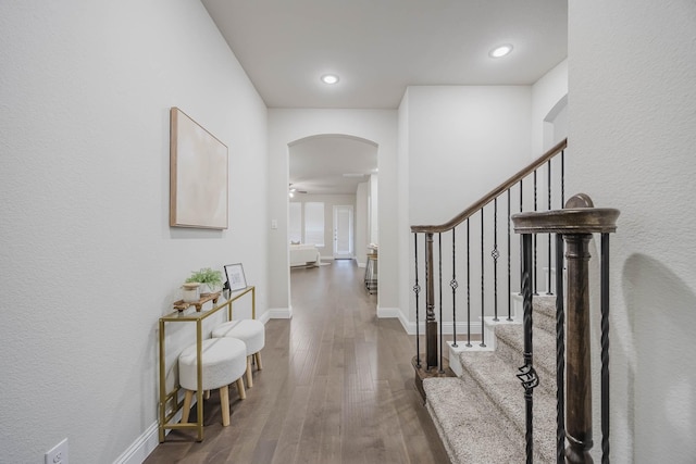 14844 Gentry Dr, Aledo, TX 76008 - corridor featuring arched walkways, wood finished floors, stairs, baseboards, and recessed lighting