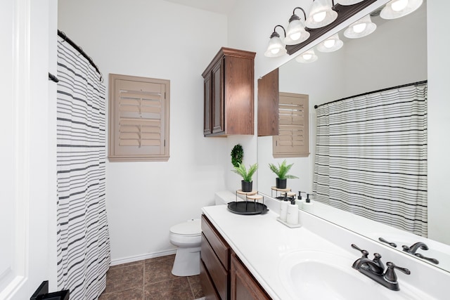 3159 Market Center Dr, Rockwall, TX 75032 - bathroom with vanity, toilet, a shower with shower curtain, baseboards, and tile patterned floors