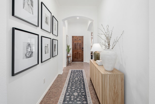 3159 Market Center Dr, Rockwall, TX 75032 - hallway with arched walkways, crown molding, and baseboards