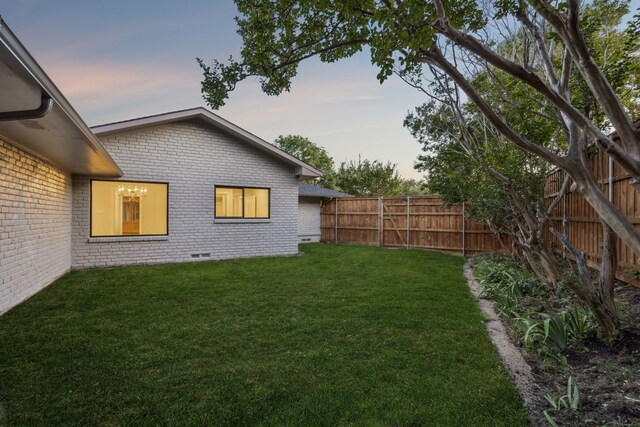 6721 Meadowcreek Dr, Dallas, TX 75254 - back of property with central AC unit, a yard, a ceiling fan, and brick siding