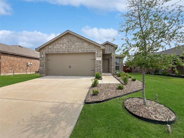 1192 Norias Dr, Forney, TX 75126 - view of front of home with brick siding, a front yard, driveway, and an attached garage