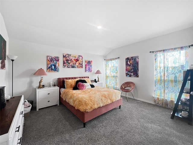1192 Norias Dr, Forney, TX 75126 - bedroom featuring lofted ceiling, dark carpet, and baseboards