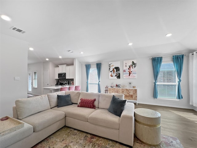 1192 Norias Dr, Forney, TX 75126 - living room featuring wood finished floors, recessed lighting, and baseboards