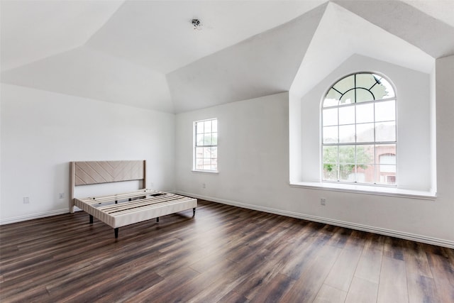 3713 Dentelle Dr, Plano, TX 75023 - unfurnished room featuring vaulted ceiling, wood finished floors, and baseboards