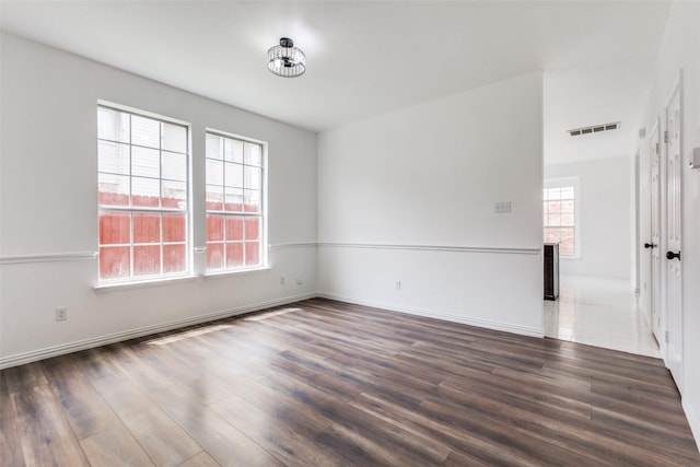 3713 Dentelle Dr, Plano, TX 75023 - unfurnished room with wood finished floors and baseboards