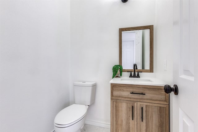 3713 Dentelle Dr, Plano, TX 75023 - half bathroom featuring toilet, vanity, and baseboards
