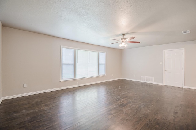 6917 Richlynn Ter, Richland Hills, TX 76118 - spare room with ceiling fan, dark wood-style flooring, baseboards, and a textured ceiling