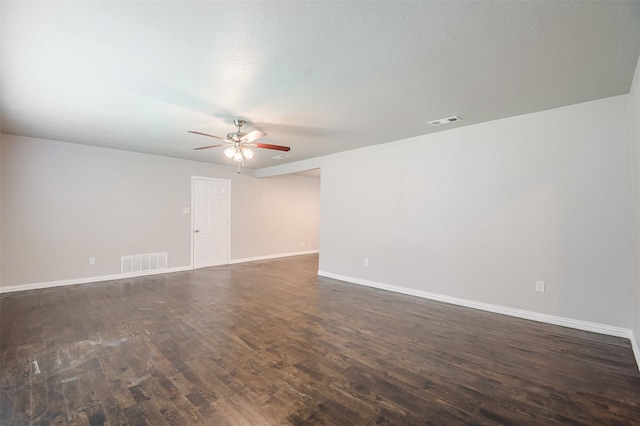 6917 Richlynn Ter, Richland Hills, TX 76118 - unfurnished room with ceiling fan, dark wood-style flooring, and baseboards