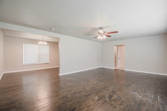 6917 Richlynn Ter, Richland Hills, TX 76118 - spare room with a chandelier, dark wood finished floors, baseboards, and ceiling fan