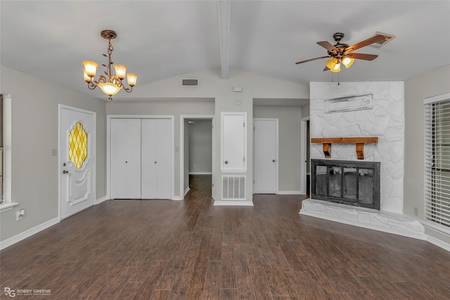 7008 Soda Point Dr, Shreveport, LA 71107 - unfurnished living room with ceiling fan, wood finished floors, a chandelier, a stone fireplace, and baseboards