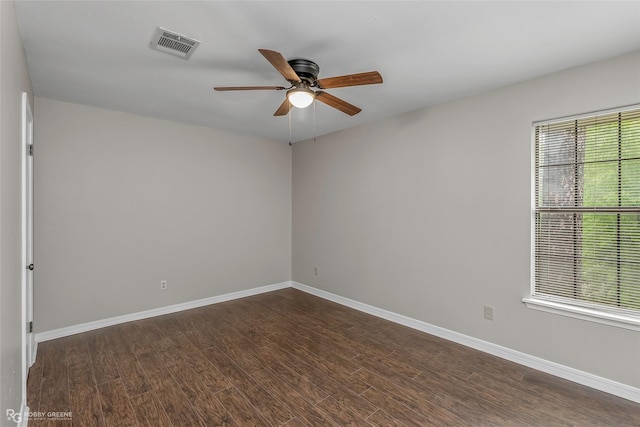7008 Soda Point Dr, Shreveport, LA 71107 - spare room featuring ceiling fan, dark wood finished floors, and baseboards