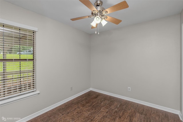 7008 Soda Point Dr, Shreveport, LA 71107 - unfurnished room with baseboards, dark wood-style floors, and a ceiling fan