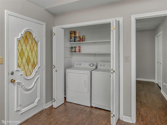 7008 Soda Point Dr, Shreveport, LA 71107 - washroom featuring washer and clothes dryer, dark wood-style flooring, and baseboards