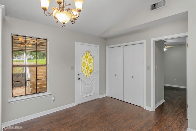 7008 Soda Point Dr, Shreveport, LA 71107 - foyer with a chandelier, vaulted ceiling, dark wood-style flooring, baseboards, and ceiling fan