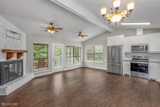 7008 Soda Point Dr, Shreveport, LA 71107 - unfurnished living room featuring dark wood-style flooring, a stone fireplace, a ceiling fan, a chandelier, and baseboards