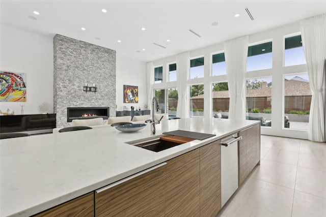 11110 Saint Michaels Dr, Dallas, TX 75230 - kitchen featuring a sink, modern cabinets, healthy amount of natural light, light countertops, and recessed lighting
