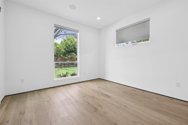 11110 Saint Michaels Dr, Dallas, TX 75230 - unfurnished room featuring wood finished floors and recessed lighting