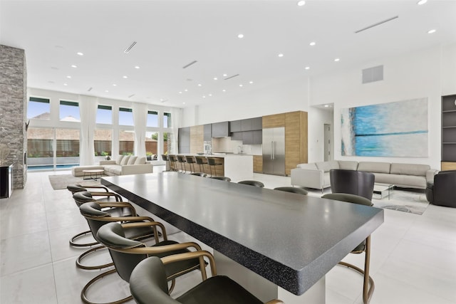 11110 Saint Michaels Dr, Dallas, TX 75230 - dining space with recessed lighting and light tile patterned floors
